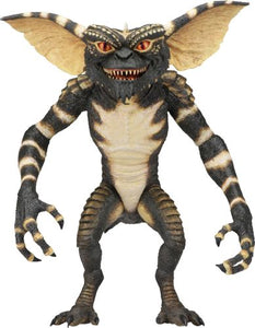 To honor the first appearance of a Gremlin in our Ultimate line, NECA has completely re-sculpted the original 1984 Gremlin body. Any fans of the Gremlins movies knows the rules: keep them out of sunlight, don&#8217;t get them wet, and never feed them after midnight. Break them and your fuzzy, friendly little Mogwai will turn into a scaly, savage Gremlin, like this deluxe 7&#8221; scale figure