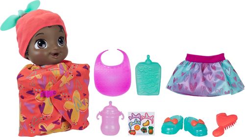 Includes doll with attached onesie, swaddle blanket, bottle, food pouch, bib, hat, brush, skirt, shoes, instructions, quickstart guide and activity sheet. For ages 3+ WARNING: Small parts may be generated. Note: Adult should remove and discard fasteners/packaging components. SURFACE CLEAN ONLY